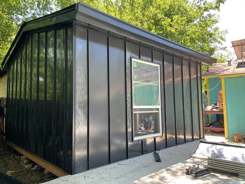 Black standing seam metal wall panels for Roof Inspection in Dana Point